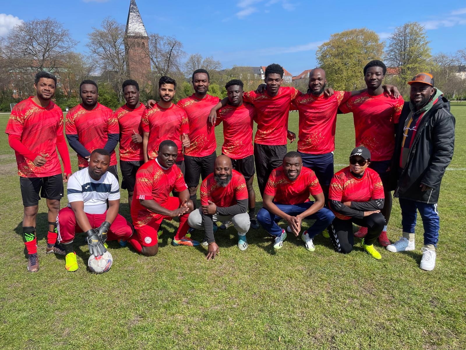Kisumparken Keepfit Club squad together on the football pitch